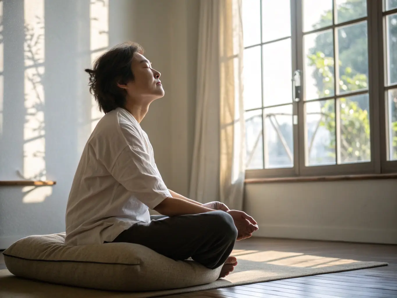 A person listening to calming music through Wireless Earbuds while meditating in a serene environment. The scene should emphasize the earbuds' ability to enhance relaxation and reduce stress.